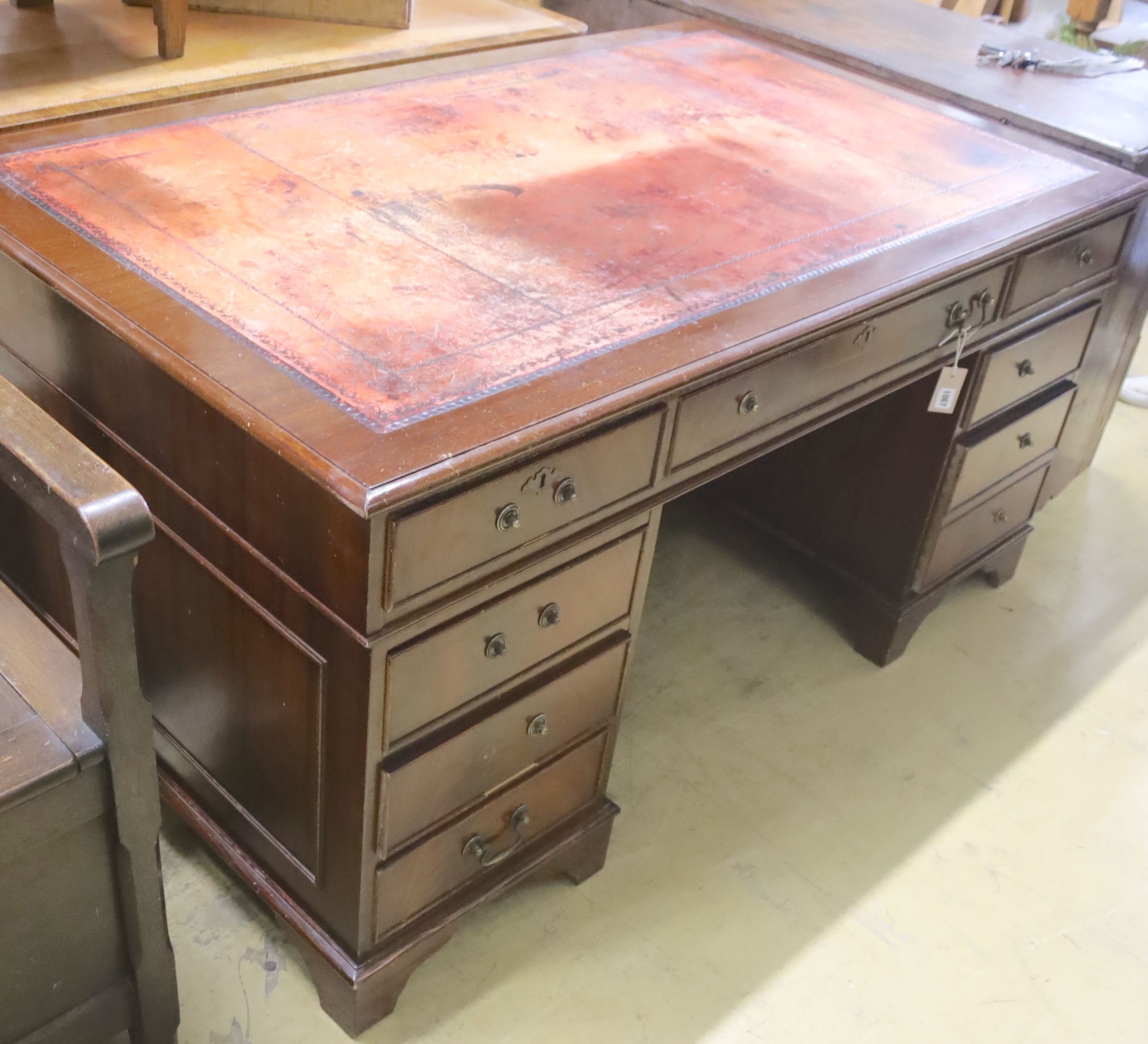 A reproduction mahogany pedestal desk, length 152cm, depth 91cm, height 74cm
